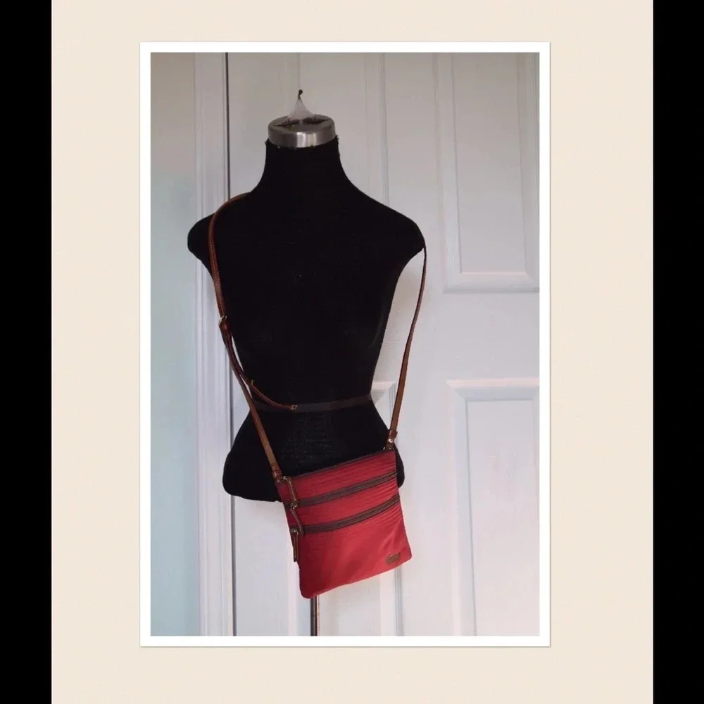 Dooney & Bourke triple zip cross body bag
